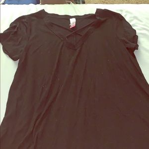 A black cross cross designed shirt